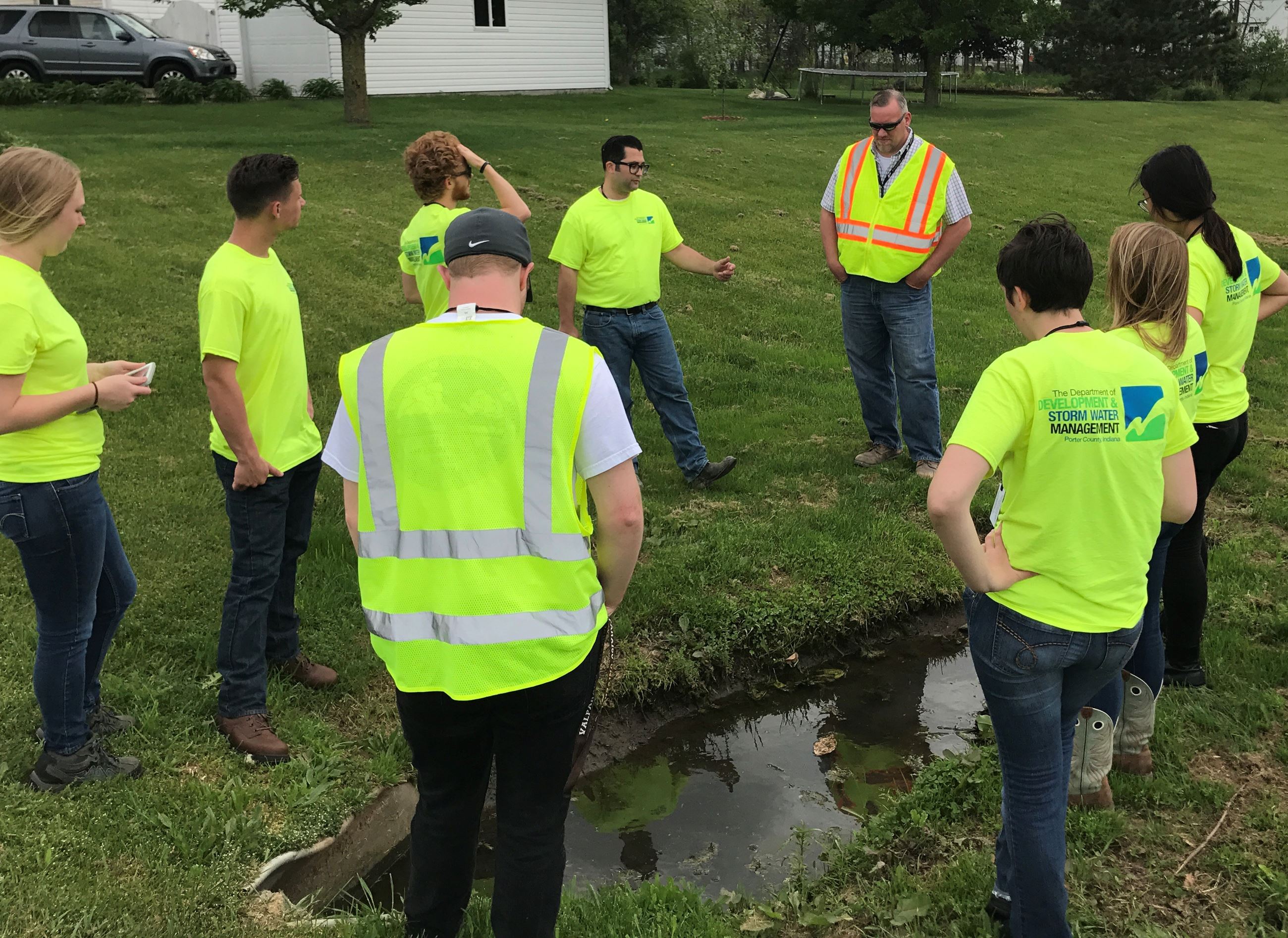 Department staff training interns on storm water practices. 